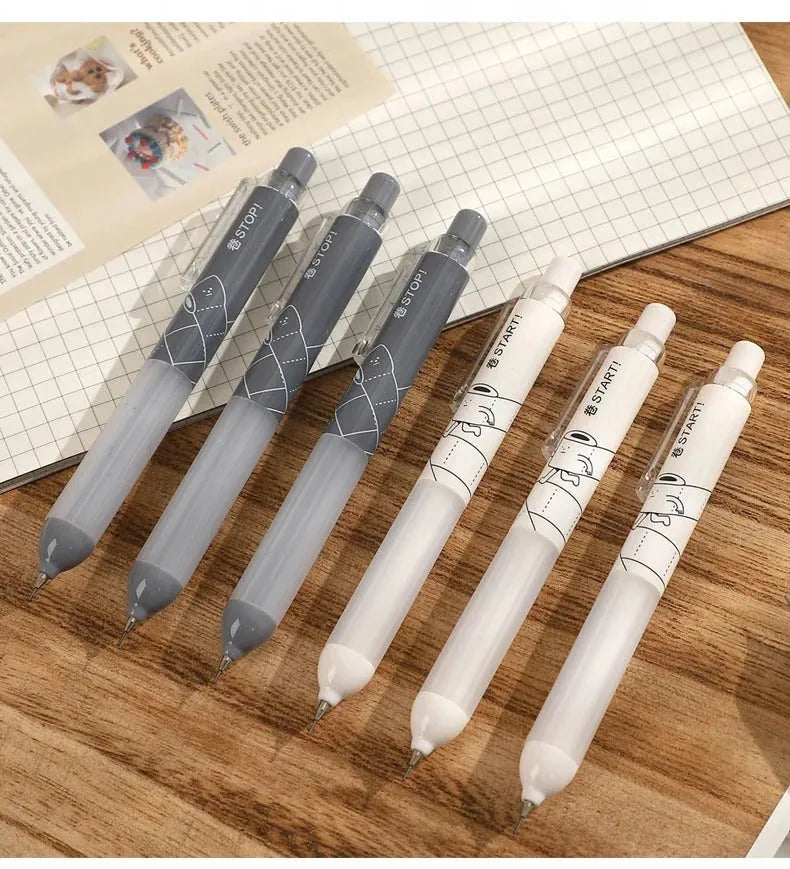 Black and white 0.5mm automatic pencils with a soft cloud grip on the barrel.