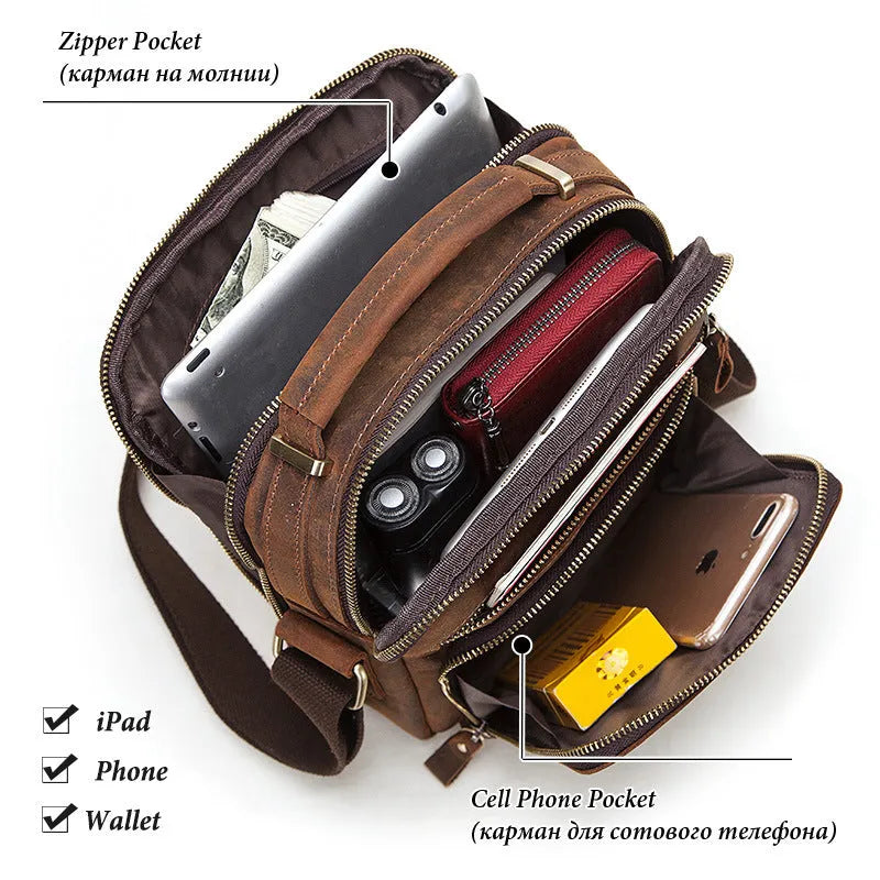 Men's brown Crazy Horse leather crossbody bag with sewing line detail on a table.