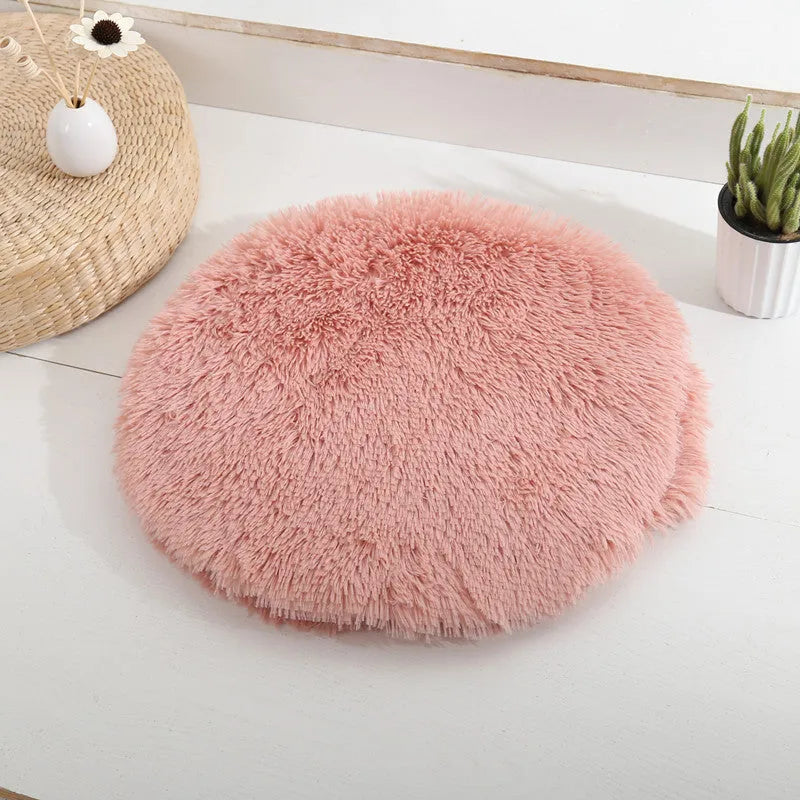 Round polyester pet bed for small dogs and cats in grey, with a quilted surface and raised rim, 40cm diameter.