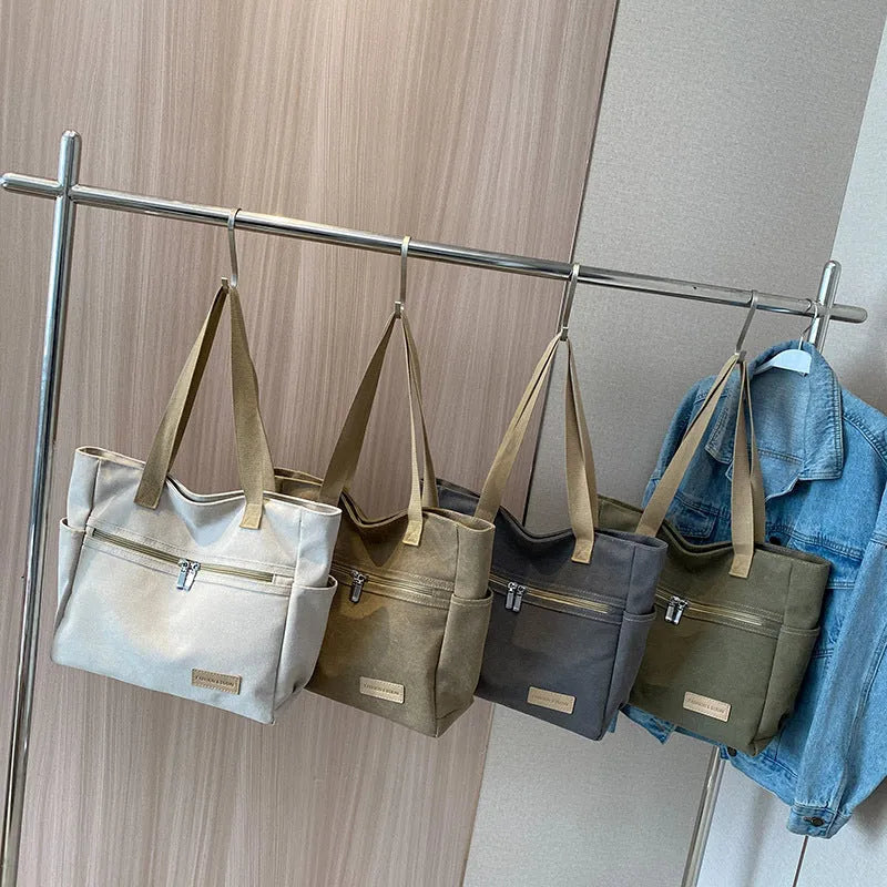 Canvas shoulder bag women's tote handbag in gray with contrast stitching and double shoulder straps