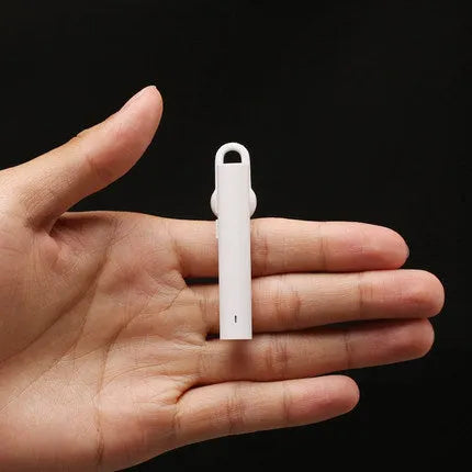 Compact wireless Bluetooth headset measuring 5.6cm with black and white colour options