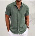 Light grey men's lapel collar cardigan on a hanger, showing long sleeves and a loose knit fit.