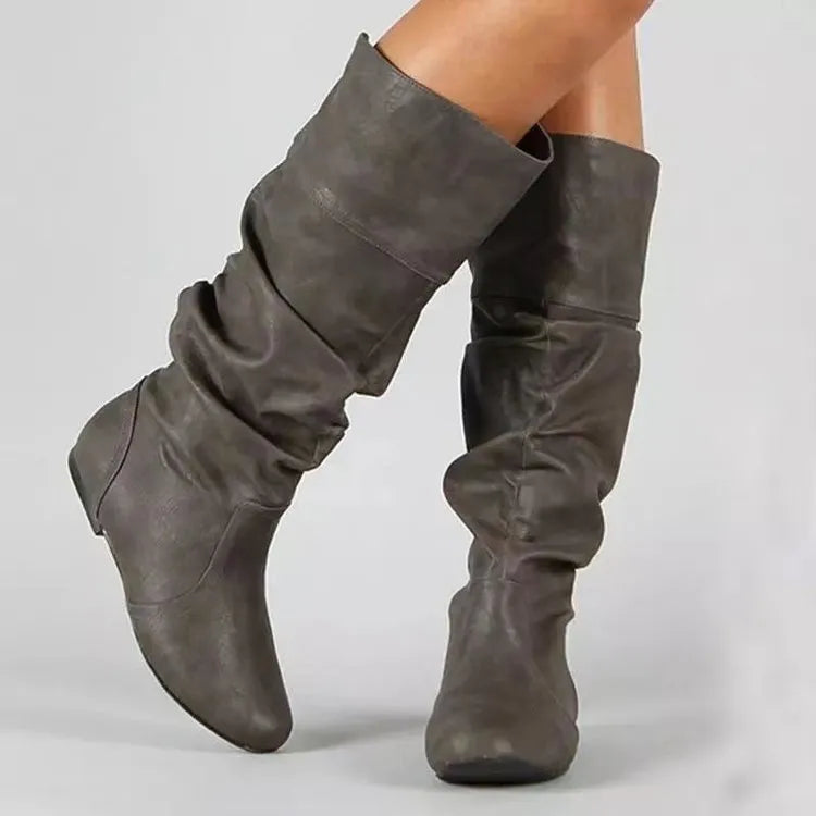 Women's black slip-on flat long boots with round toe and high shaft