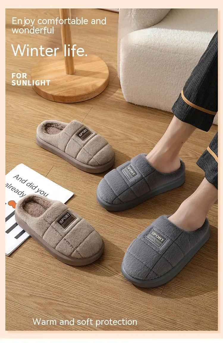 Men's grey plaid winter slippers with thick sole and rabbit hair upper.