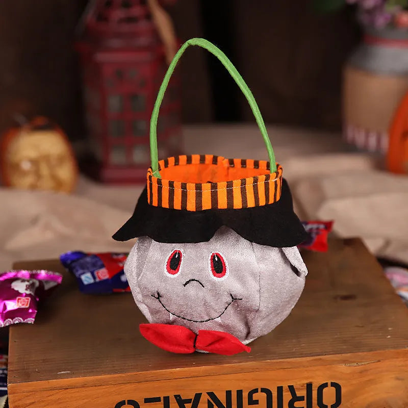 Square 16cm Halloween candy bag in pumpkin, witch, vampire, or black cat velvet pattern.