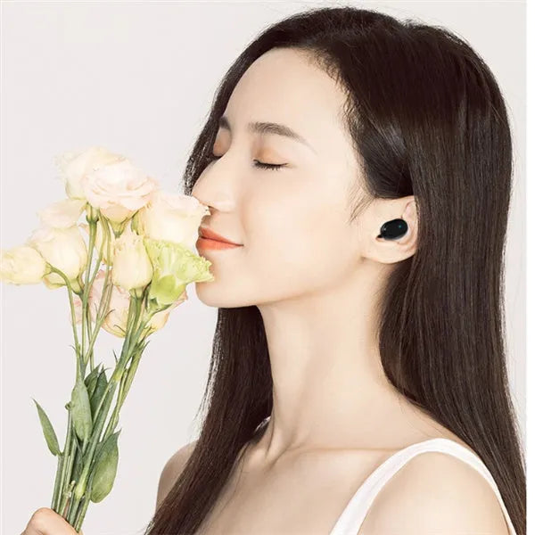 M1 Bluetooth wireless earphones in black or white colour with earbud style design