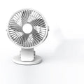USB mini clip fan in green, with 135mm blade, clipped to a desk edge, showing USB cable connection