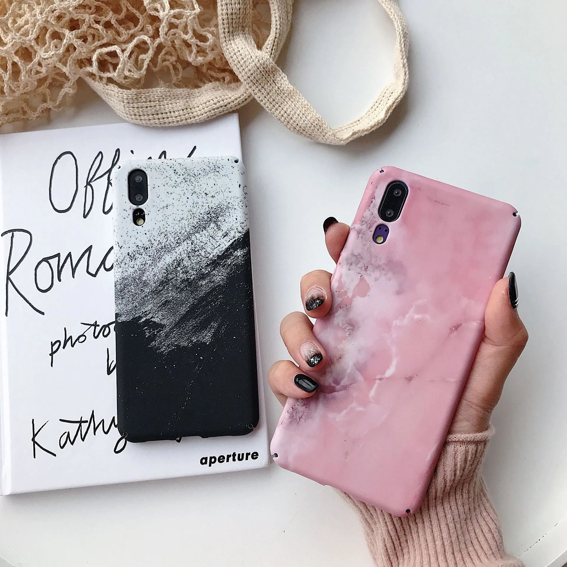Solid colour painted phone case for Huawei and Honor smartphones in black and pink options.