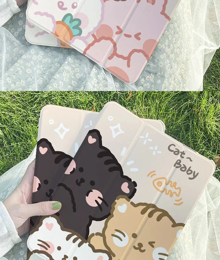 Silicone iPad case with a cartoon rabbit design lying flat, showing its tri-fold shape.