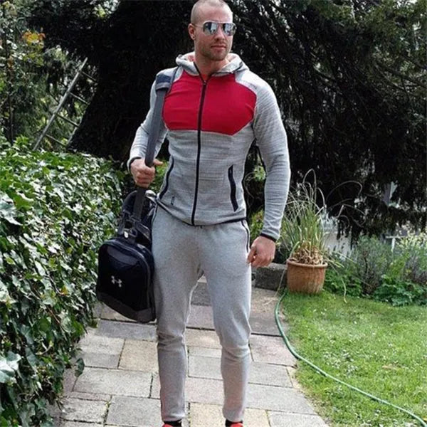 Men's slim-fit cotton sweatpants in grey black with elastic waistband and tapered leg