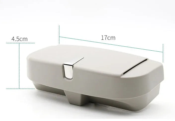 Car glasses case clipped onto sun visor, 170x70x55mm, silver coated tape and steel wire construction
