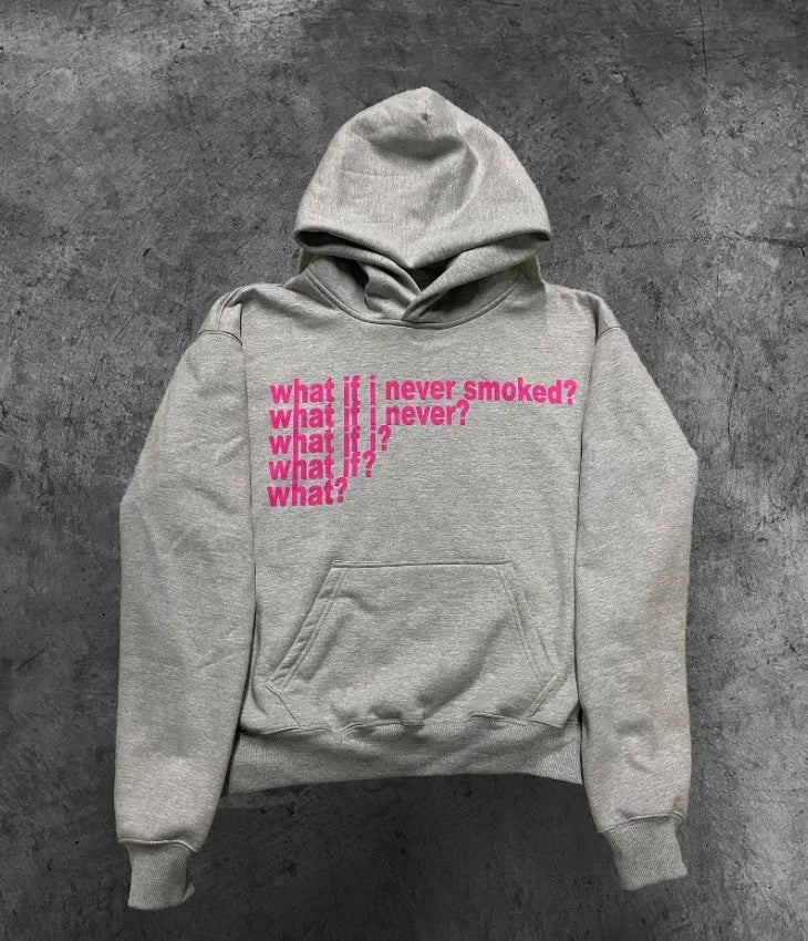 Black heavy hooded sweater with white letter print on chest, shown on a model.