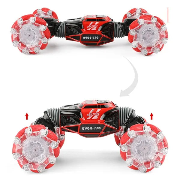 Red remote control stunt car with gesture control, morphing off-road tyres, lights, and music, measuring 32 cm long