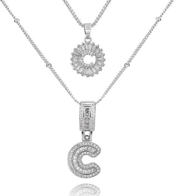 26 English letters copper-plated gold diamond initial pendant necklace with adjustable chain on display