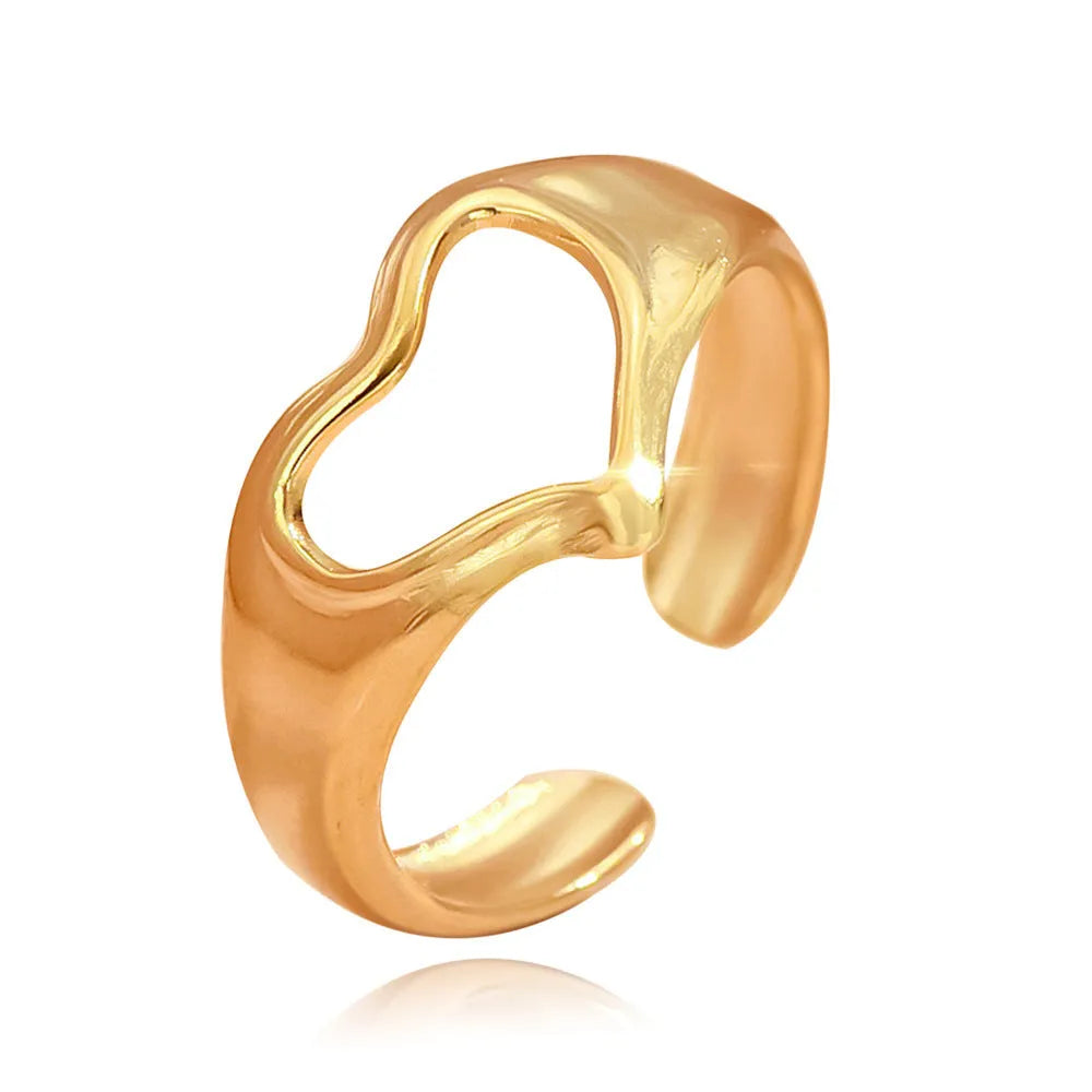 Adjustable hollow heart open ring in stainless steel with U-shaped band and rose motif, shown in steel or gold colour