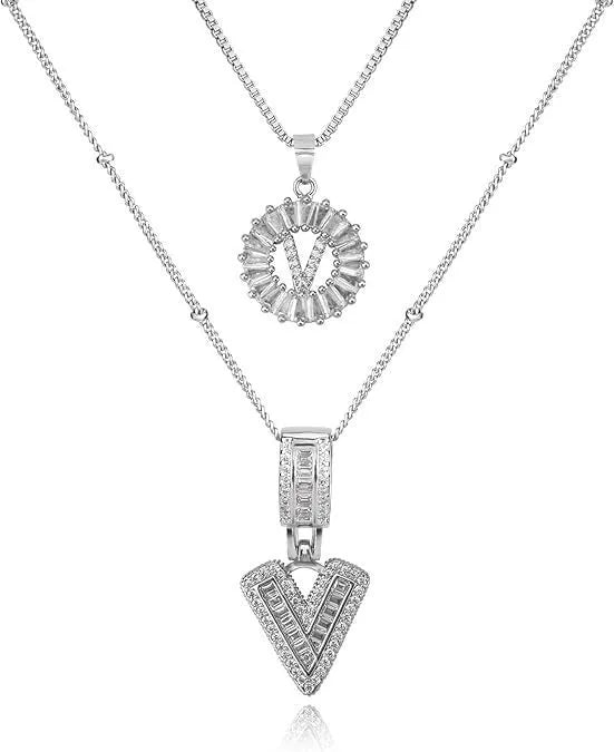 26 English letters copper-plated gold diamond initial pendant necklace with adjustable chain on display