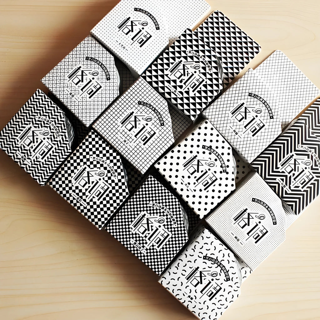Roll of 15mm wide decorative paper tape in lattice, wave point, and weave patterns for crafts