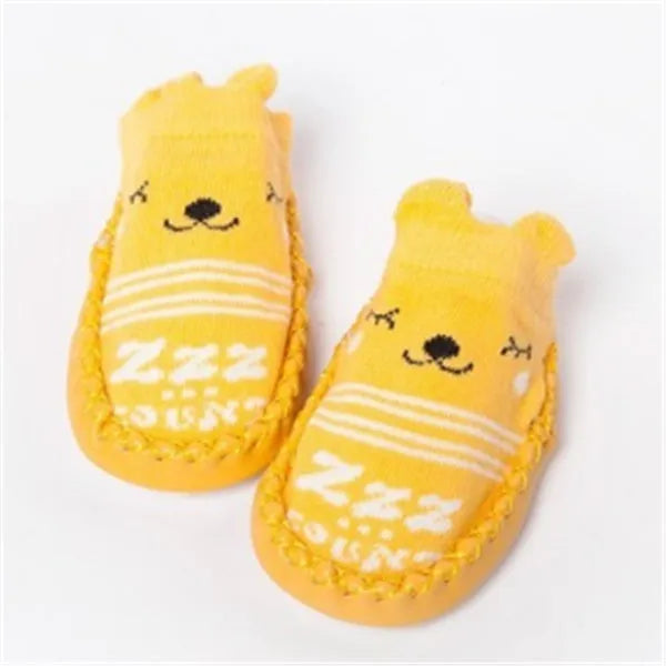 Baby floor socks with anti-slip sole in combed cotton fabric, showing colour and pattern options