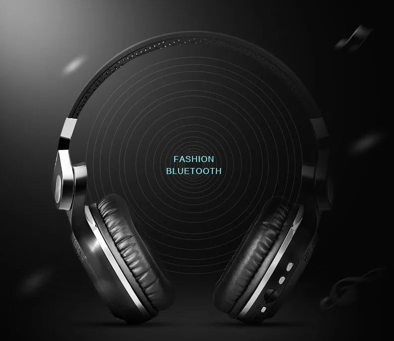 Wireless Bluetooth headset in black colour with headband and bilateral earpieces for hands-free calls and music.