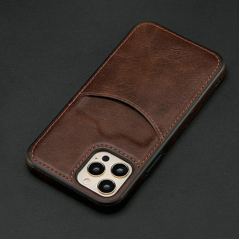 Dark blue PU leather protective case fitted on an iPhone showing textured finish and precise button cut-outs.