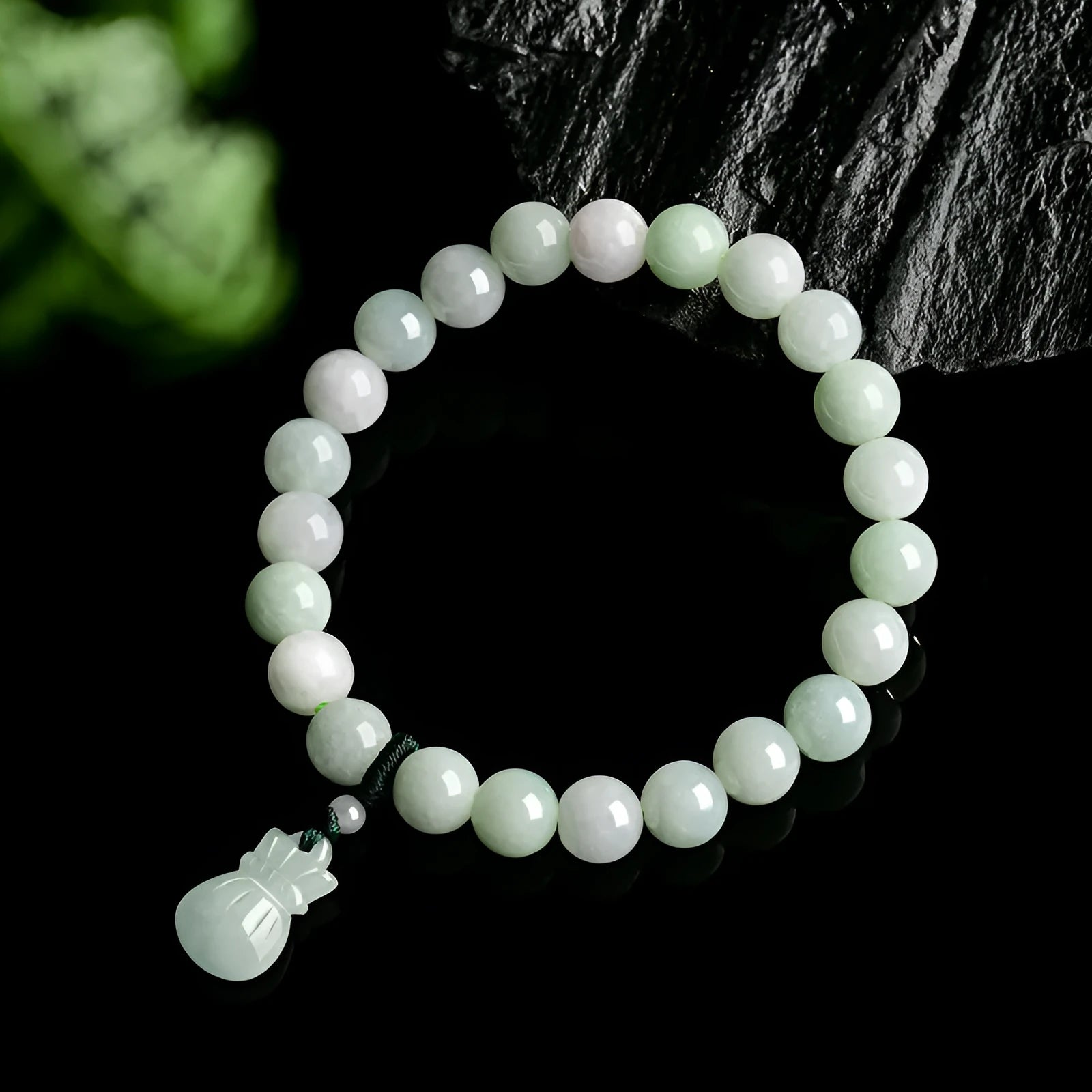 Unisex jade flower purse bracelet with 8mm beads in a national style.