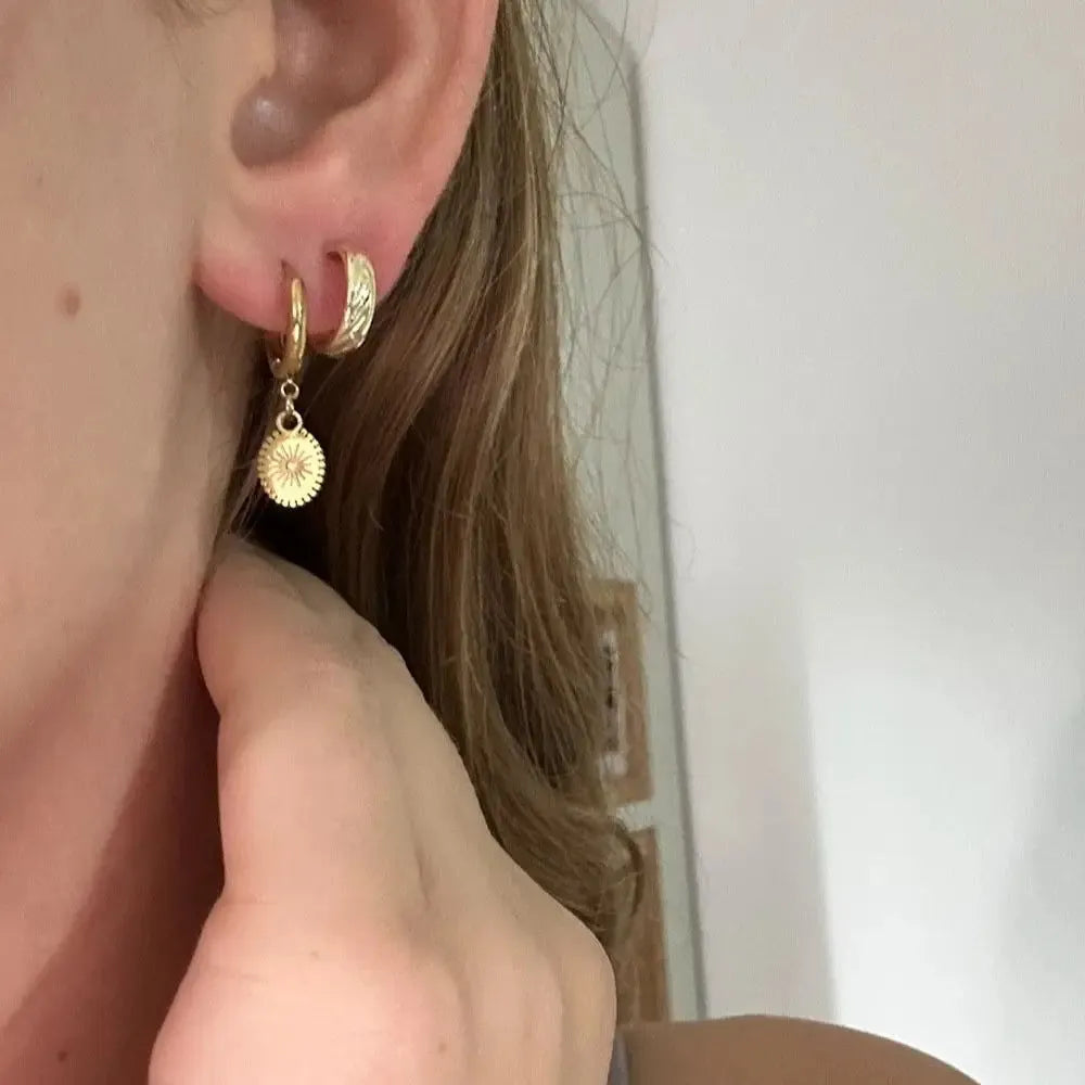Stainless steel geometric ellipse ear button earrings in colour XY-EH005.