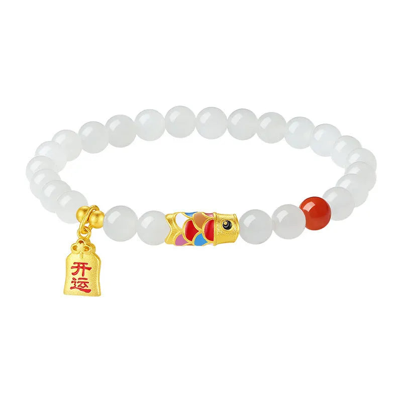 S925 sterling silver bracelet with a blue cold enamel and natural Hetian jade koi fish charm.