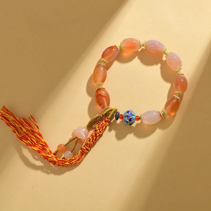 Handcrafted agate Tibetan bracelet with flower and geometric designs in vintage ethnic style