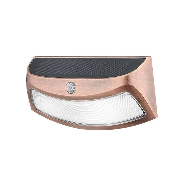 Solar-powered smiling face outdoor wall lamp with warm or white light options.