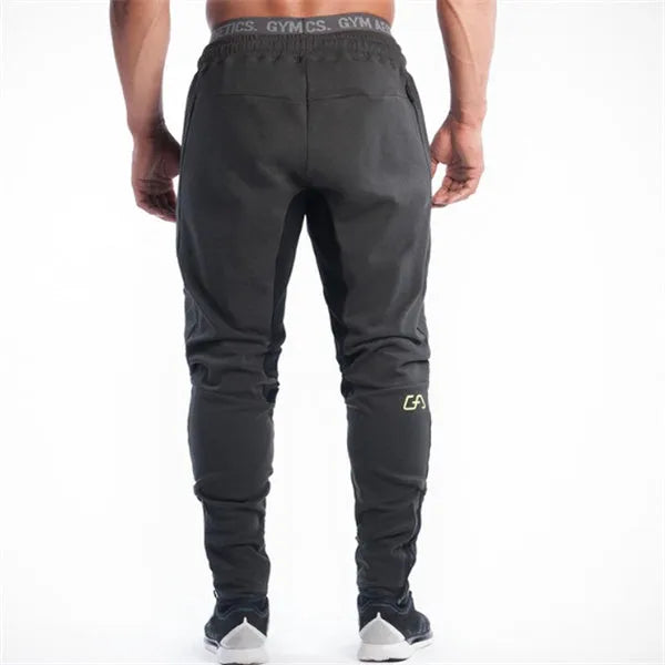 Men's slim-fit cotton sweatpants in grey black with elastic waistband and tapered leg
