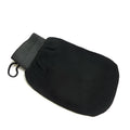 Exfoliating kessa scrub glove made from loofah material, single mitt for shower body exfoliation and self tan preparation