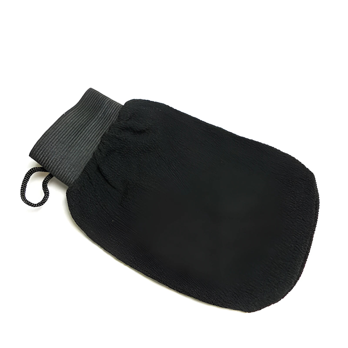 Exfoliating kessa scrub glove made from loofah material, single mitt for shower body exfoliation and self tan preparation