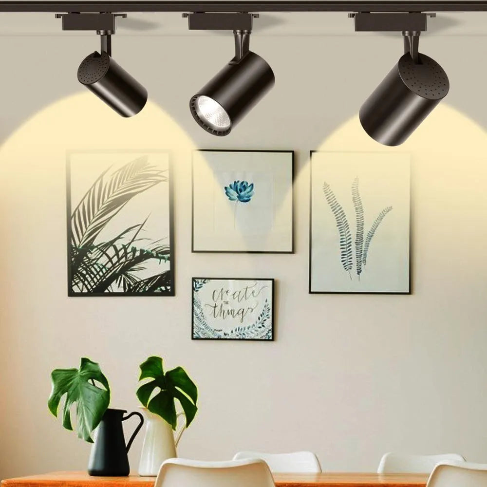 LED track spotlight in black with 24-degree beam angle and 10W power, suitable for jewellery and retail lighting