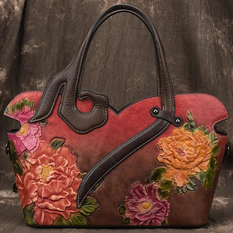 Women's genuine cowhide leather tote bag with floral embossing and zipper closure, horizontal square shape