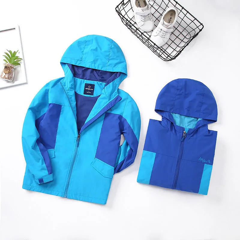 Blue thin children's autumn jacket with long sleeves and a front zip, laid flat showing size label.