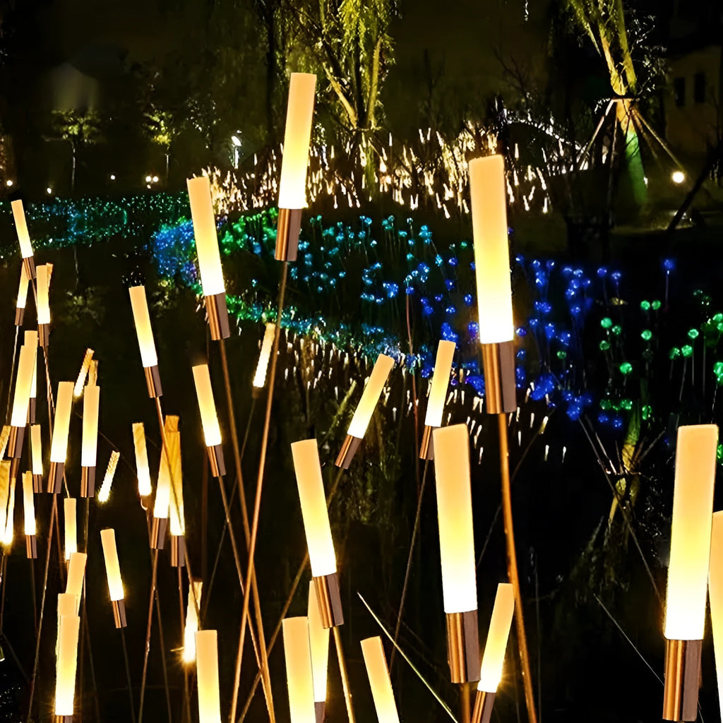 Solar outdoor LED lawn lamp with acrylic shade, available in multiple heights, installed in a garden.