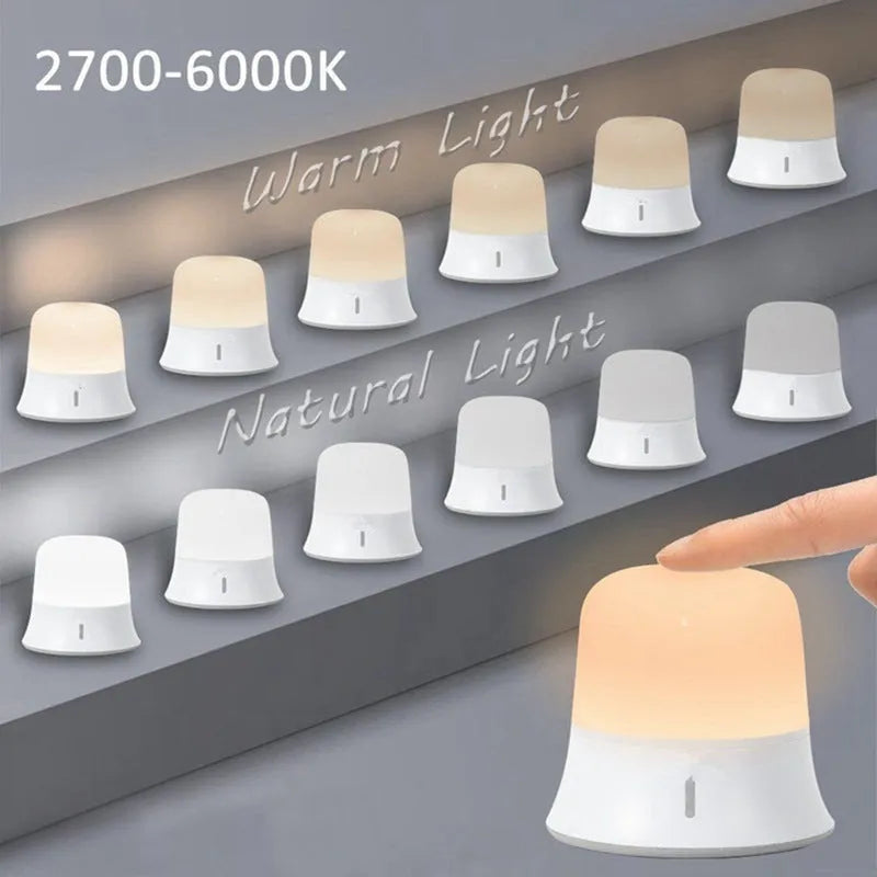 White bedside night light with touch controls, motion sensor, and rechargeable battery.