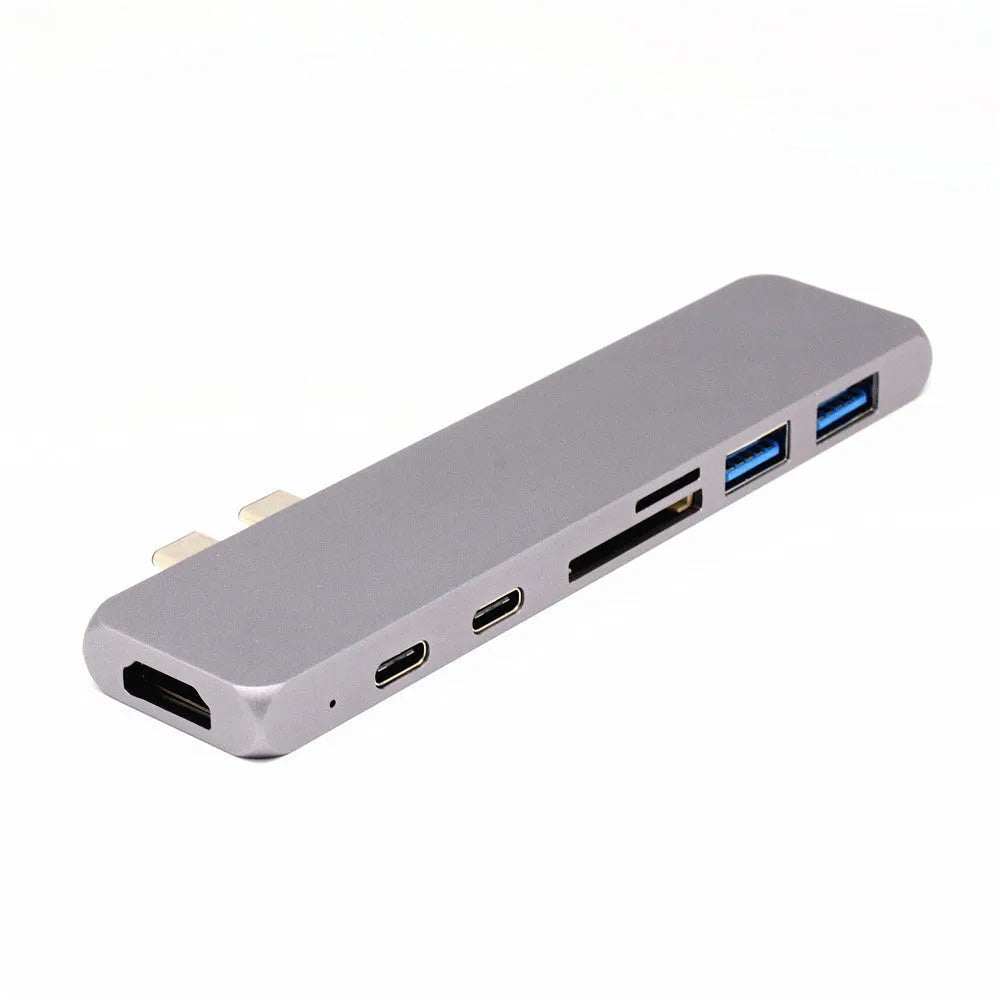 Dual Type-C seven-in-one hub in aluminium-magnesium alloy with HDMI and USB ports, 12.7cm long