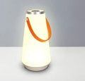White rechargeable LED night light with touch controls measuring 12x12x22cm