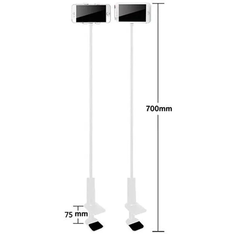 Black flexible magnalium phone and tablet mount holder with suction base on a table
