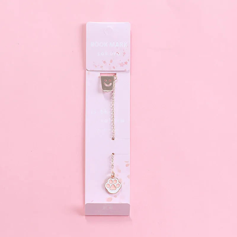 Alloy metal bookmark with cartoon pendant designs including panda, rocket and unicorn variations