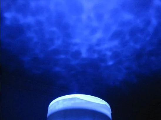 Blue ocean-themed LED projection lamp for children's rooms and play areas.