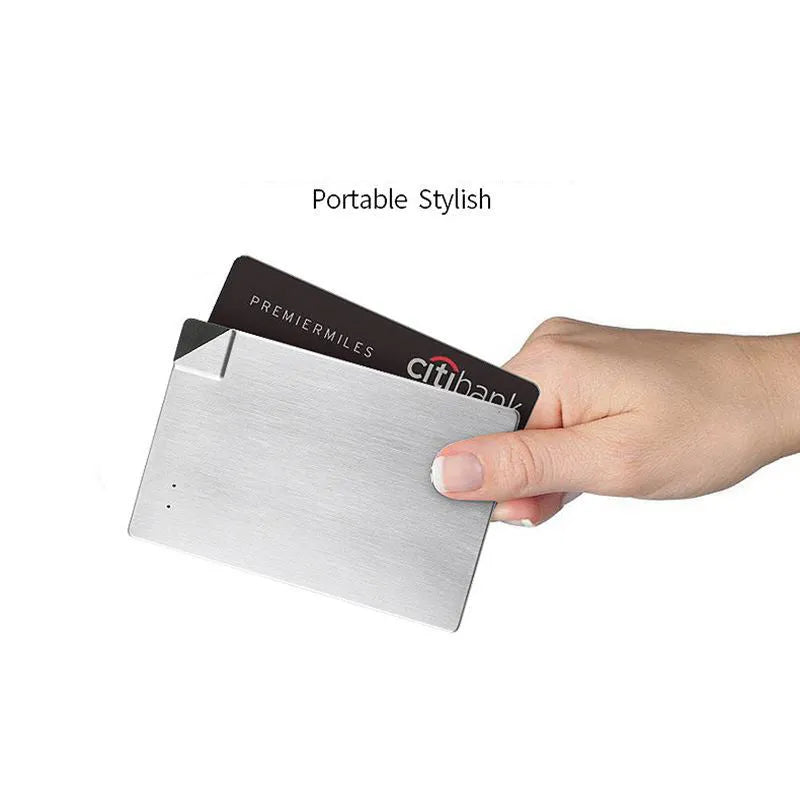 Silver aluminium graphene power bank showing slim 4mm profile with Lightning and Micro-USB ports