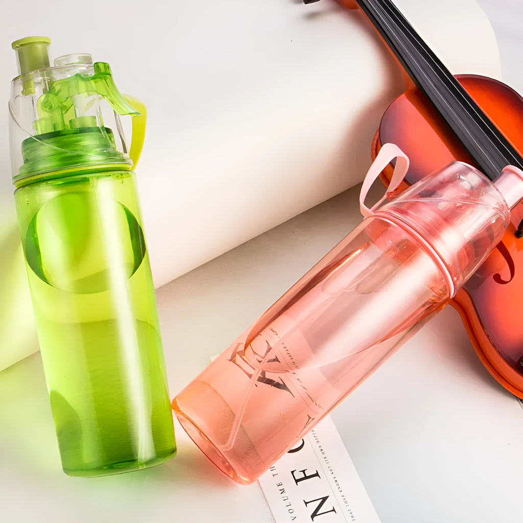 600ml spray water bottle in pink and black colours for sports and outdoor use