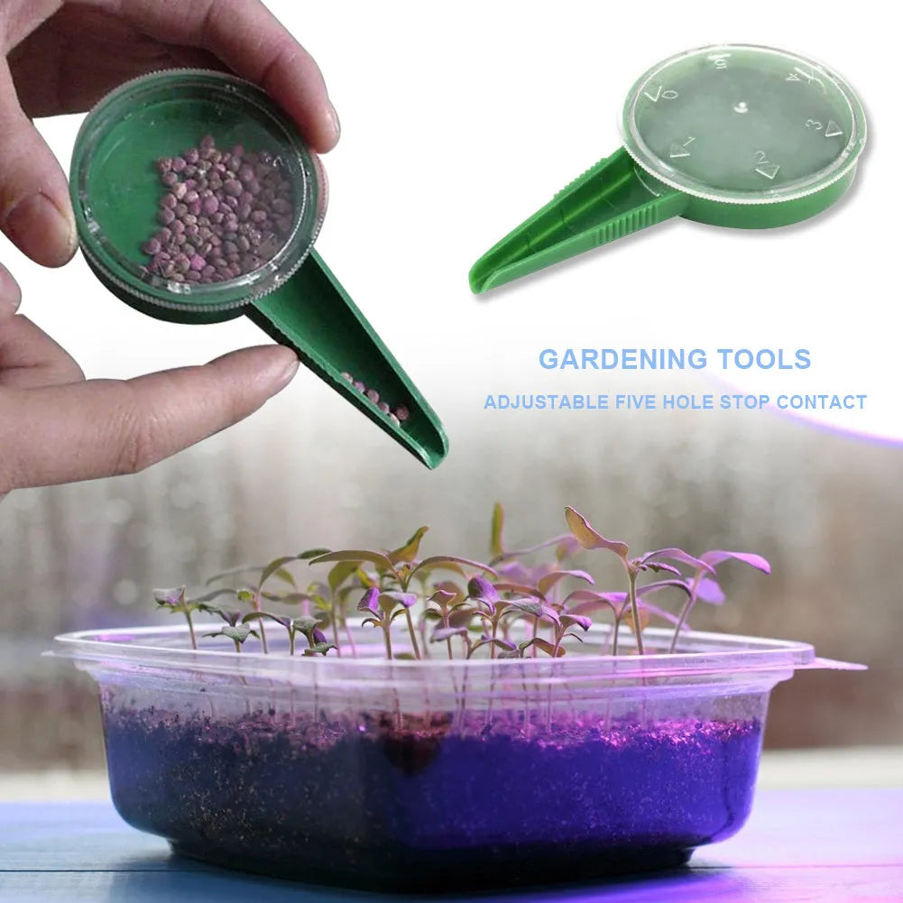 5-speed adjustable dial seed sower in transparent green plastic, approx 12cm long