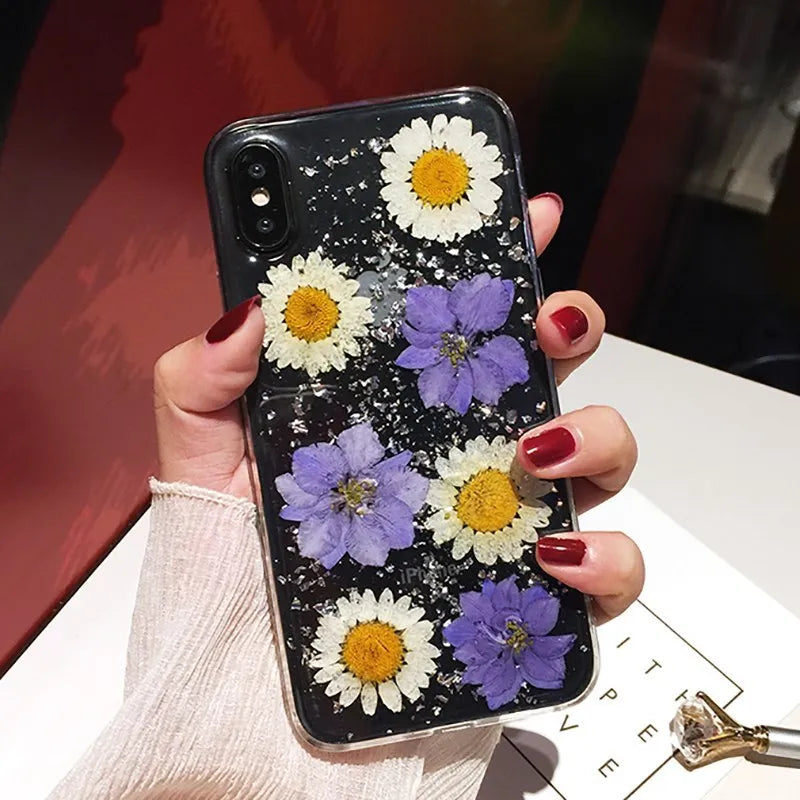 Handmade clear iPhone case with preserved dried flowers in epoxy resin sealing