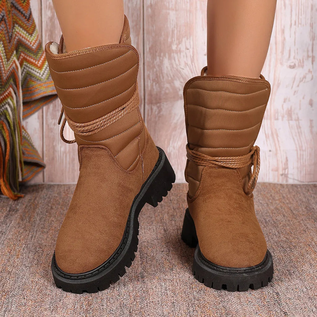 Women's chunky heel high-top snow boots in suede with fleece lining, shown in black, brown, and grey.