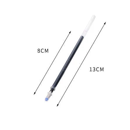 Automatic fade and disappear pen set showing pen holder, case, and eight refills on a notepad.