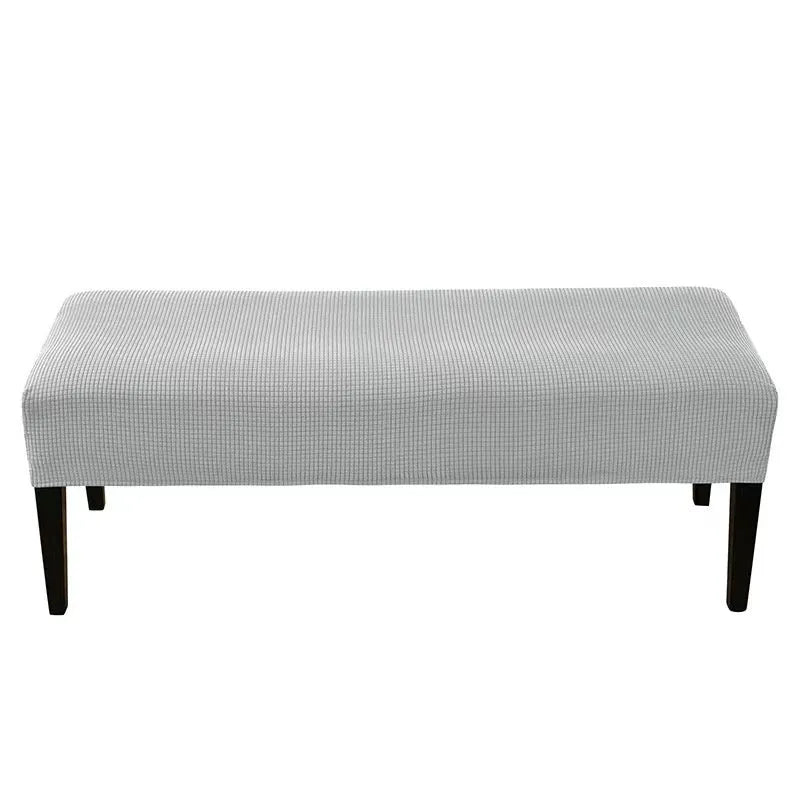 Stretch chair cover 150x45x14cm in plush fabric with non-slip base, shown in beige colour option