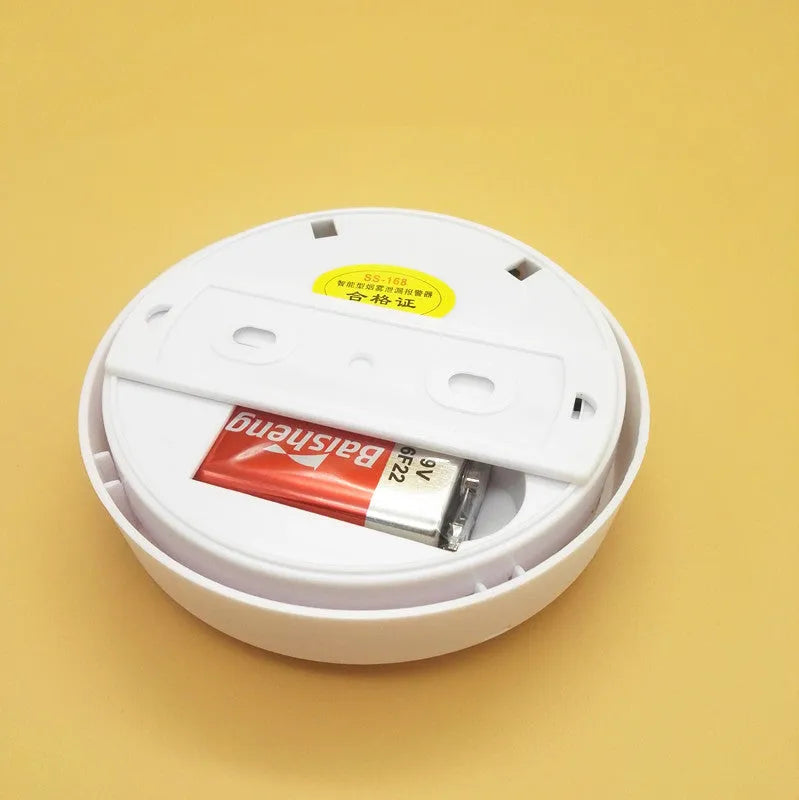 White ceiling mount household smoke alarm model SS-168 with 60m detection range